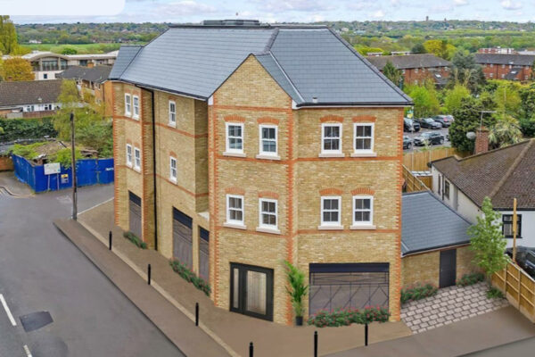 Planning granted & built seven apartments and two commercial units.